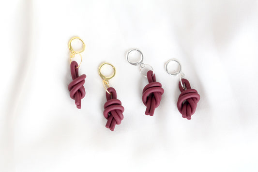 Knotted Dangles in Wine